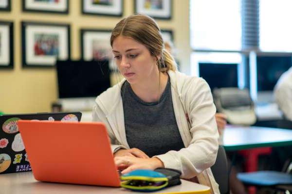 Student working on a laptop